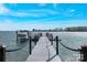 Scenic view of private dock with boat lift, nestled on calm waters with lush green surroundings at 356 Yacht Rd, Mooresville, NC 28117