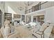 Spacious living room with fireplace, built-in shelves, high ceilings and comfortable seating at 356 Yacht Rd, Mooresville, NC 28117