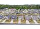 Overhead view of a well-maintained neighborhood featuring single-Gathering homes with landscaped yards and attached garages at 3618 Marchers Trace Dr, Mint Hill, NC 28227