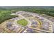 Aerial view of a neighborhood with lush landscaping, mature trees and sidewalks in a serene community at 3618 Marchers Trace Dr, Mint Hill, NC 28227