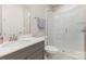Bathroom with a white vanity, glass-enclosed shower, and modern fixtures at 3618 Marchers Trace Dr, Mint Hill, NC 28227