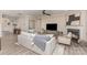 Bright living room featuring neutral decor, fireplace, ceiling fan, and comfortable seating arrangement at 3618 Marchers Trace Dr, Mint Hill, NC 28227