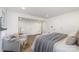 Cozy bedroom with plush armchair, comfortable bed, and soft lighting, perfect for relaxation at 3619 Bankston Pl, Charlotte, NC 28215