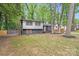 Charming two-story home with a modern black and grey exterior and landscaped front yard at 3619 Bankston Pl, Charlotte, NC 28215