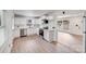 Bright kitchen featuring white cabinets, stainless steel appliances, and granite countertops at 3619 Bankston Pl, Charlotte, NC 28215
