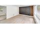 Bright living room with wood floors, custom accent wall, and ample natural light at 3619 Bankston Pl, Charlotte, NC 28215