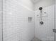 Modern bathroom with a fully tiled shower, updated fixtures, and clean, minimalist design at 3700 Carolina Cherry Ct, Gastonia, NC 28056