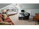 Angled bedroom with neutral colored walls, soft carpet, a ceiling fan, a bed, and furniture at 3700 Carolina Cherry Ct, Gastonia, NC 28056