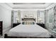 Well-appointed main bedroom featuring a luxurious king bed, side tables and tasteful decor at 3700 Carolina Cherry Ct, Gastonia, NC 28056