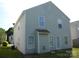 Exterior view of home's siding and backyard at 391 Morning Dew Dr, Concord, NC 28025