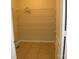 Walk-in closet with tile floor, multiple shelves and hanging rod, perfect for storage at 391 Morning Dew Dr, Concord, NC 28025