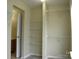 Spacious closet featuring built-in shelving and ample storage space at 391 Morning Dew Dr, Concord, NC 28025