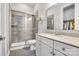 Modern bathroom features a glass-enclosed shower, updated vanity, and neutral color scheme at 4008 Pinot Way, Fort Mill, SC 29707
