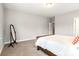 This bedroom features a bed, floor mirror, carpet and a ceiling light at 4008 Pinot Way, Fort Mill, SC 29707