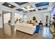 Bright living room showcasing a coffered ceiling, recessed lighting, and hardwood flooring at 4008 Pinot Way, Fort Mill, SC 29707
