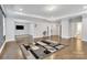 Spacious living room features hardwood floors, recessed lighting and neutral color palette at 4008 Pinot Way, Fort Mill, SC 29707