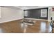 This room has hardwood floors, an area rug and windows at 4008 Pinot Way, Fort Mill, SC 29707
