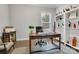 Charming home office with natural light, built-in shelving, and comfortable seating at 4008 Pinot Way, Fort Mill, SC 29707