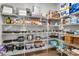 Walk-in pantry featuring ample shelving, offering abundant storage for food, cookware and kitchen essentials at 4008 Pinot Way, Fort Mill, SC 29707