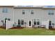 View of the home's back patio with seating for relaxing outdoors at 4206 Steel Way, Sherrills Ford, NC 28673