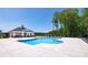 Community pool and clubhouse surrounded by landscaped greenery at 4206 Steel Way, Sherrills Ford, NC 28673