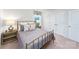 Bright bedroom with a window, features a cozy bed, soft carpet, and closet at 4208 Steel Way, Sherrills Ford, NC 28673