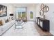 Bright living room with neutral tones, hardwood floors, and natural light at 4208 Steel Way, Sherrills Ford, NC 28673