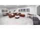 Open living area features a cozy sectional, modern bar cart, and plush carpeting at 4208 Steel Way, Sherrills Ford, NC 28673