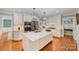 Bright eat-in kitchen boasts an island, granite countertops, and stainless appliances at 5206 Morrowick Rd, Charlotte, NC 28226