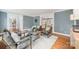 Comfortable sitting area with neutral tones offers great views of the entryway and fireplace living room at 5206 Morrowick Rd, Charlotte, NC 28226