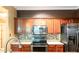 Modern kitchen boasting stainless steel appliances, updated cabinetry, and a stylish backsplash at 5310 Waverly Lynn Ln, Charlotte, NC 28269