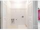 Laundry room includes washer and dryer hookups and shelving at 5310 Waverly Lynn Ln, Charlotte, NC 28269