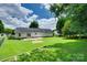 The backyard has a patio and lush green grass at 605 Summey Farm Dr, Dallas, NC 28034