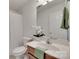 This bathroom has a wooden vanity, mirror, and a shower at 605 Summey Farm Dr, Dallas, NC 28034