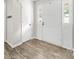 Entryway with wood flooring and multiple doors at 616 Silversmith Ln, Charlotte, NC 28270
