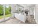 Bright kitchen featuring granite countertops, stainless steel appliances, new cabinets and a large slider at 616 Silversmith Ln, Charlotte, NC 28270