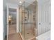 Attractive bathroom offering a glass shower, modern fixtures and tile accents at 6202 Providence Country Club Dr, Charlotte, NC 28277