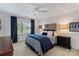 Charming bedroom with a patriotic theme and neutral colors with bright accents at 6202 Providence Country Club Dr, Charlotte, NC 28277