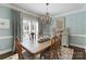 Charming dining room with natural light, classic furniture, and stylish decor, perfect for Gathering gatherings at 6202 Providence Country Club Dr, Charlotte, NC 28277