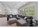 Spacious living room area with large windows and comfortable seating at 6202 Providence Country Club Dr, Charlotte, NC 28277