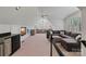 Large living space with recessed lights, TV and comfortable seating at 6202 Providence Country Club Dr, Charlotte, NC 28277