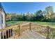 The backyard features a large green lawn and a wooden deck at 796 Old Wilkesboro Rd, Taylorsville, NC 28681