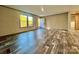 Bright living room with wood-look floors, neutral walls, and natural light at 796 Old Wilkesboro Rd, Taylorsville, NC 28681