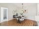 Stylish dining area with modern furnishings and decor, creating a perfect space for meals and gatherings at 9027 Mcdowell Creek Ln, Cornelius, NC 28031