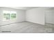 Spacious bedroom with soft carpet, a large window and a walk in closet at 906 Two Brothers Ln, York, SC 29745