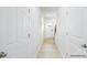 Hallway with luxury vinyl plank flooring that leads to the front door and the stairs at 906 Two Brothers Ln, York, SC 29745