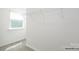 This walk in closet has ample storage space with a wire shelf and a window at 906 Two Brothers Ln, York, SC 29745