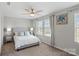 Inviting bedroom with neutral colors, a ceiling fan, and lots of natural light at 980 Bunker Trce, Rock Hill, SC 29730