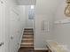 Hallway with stairs, bench, coat hooks and modern decor at 980 Bunker Trce, Rock Hill, SC 29730