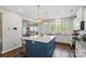 Bright, modern kitchen with a large island, stainless steel appliances, and an open layout at 980 Bunker Trce, Rock Hill, SC 29730